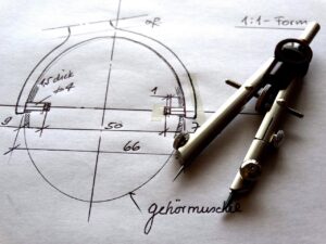 Detaillierte Zirkelzeichnung als Beweis der TONNIKUM®-System-Architektur: Präzise Planung für unschlagbaren Gründer-Erfolg.